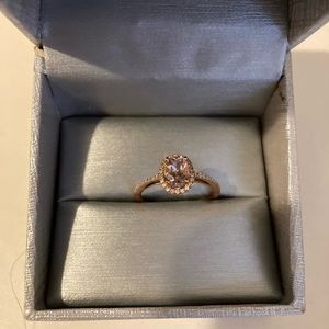 1/6 Carat oval morganite with diamond frame ring in 14k rose gold